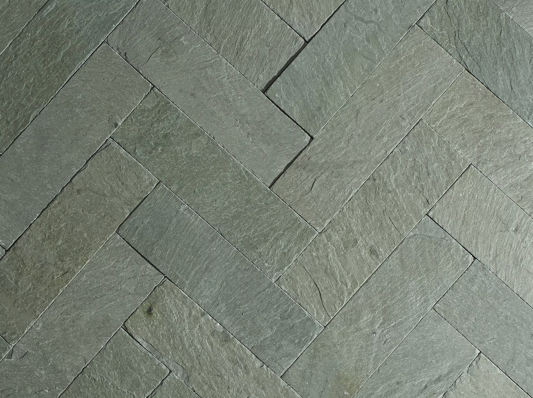 herringbone pattern of green slate